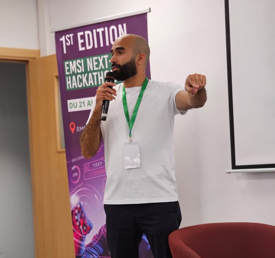 Salah speaking at the EMSI Next-Gen Hackathon